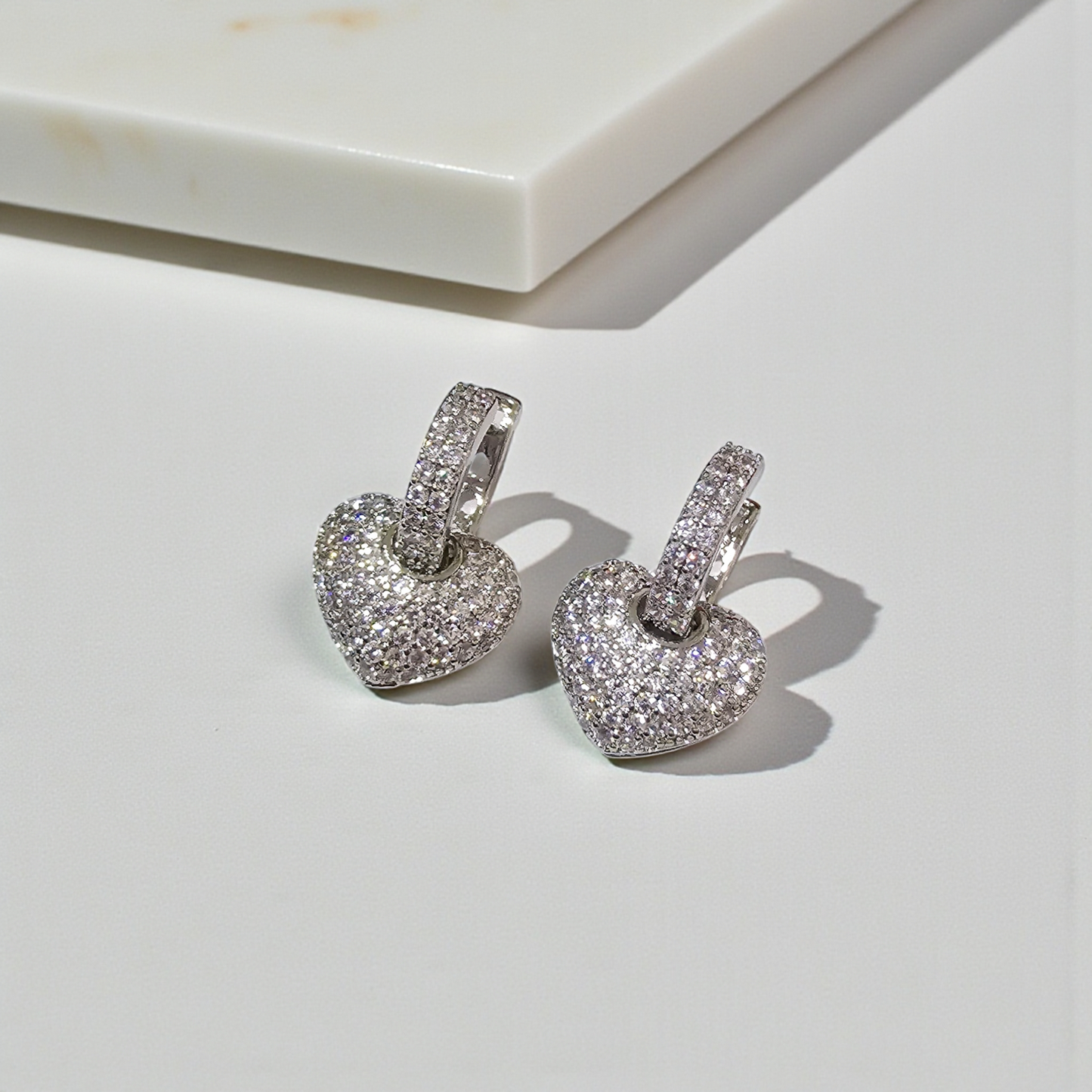 Aretes en forma de corazón doble uso